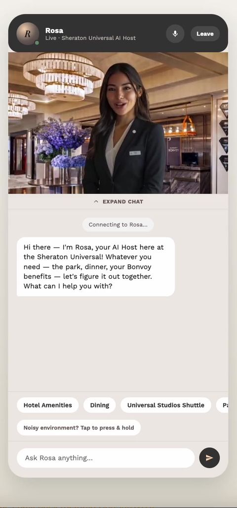Rosa greeting a guest on a phone screen